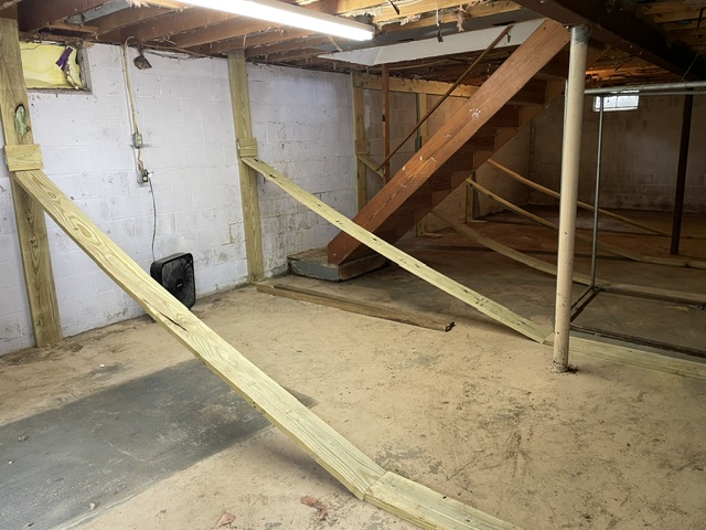Braces support a cracked foundation wall.
