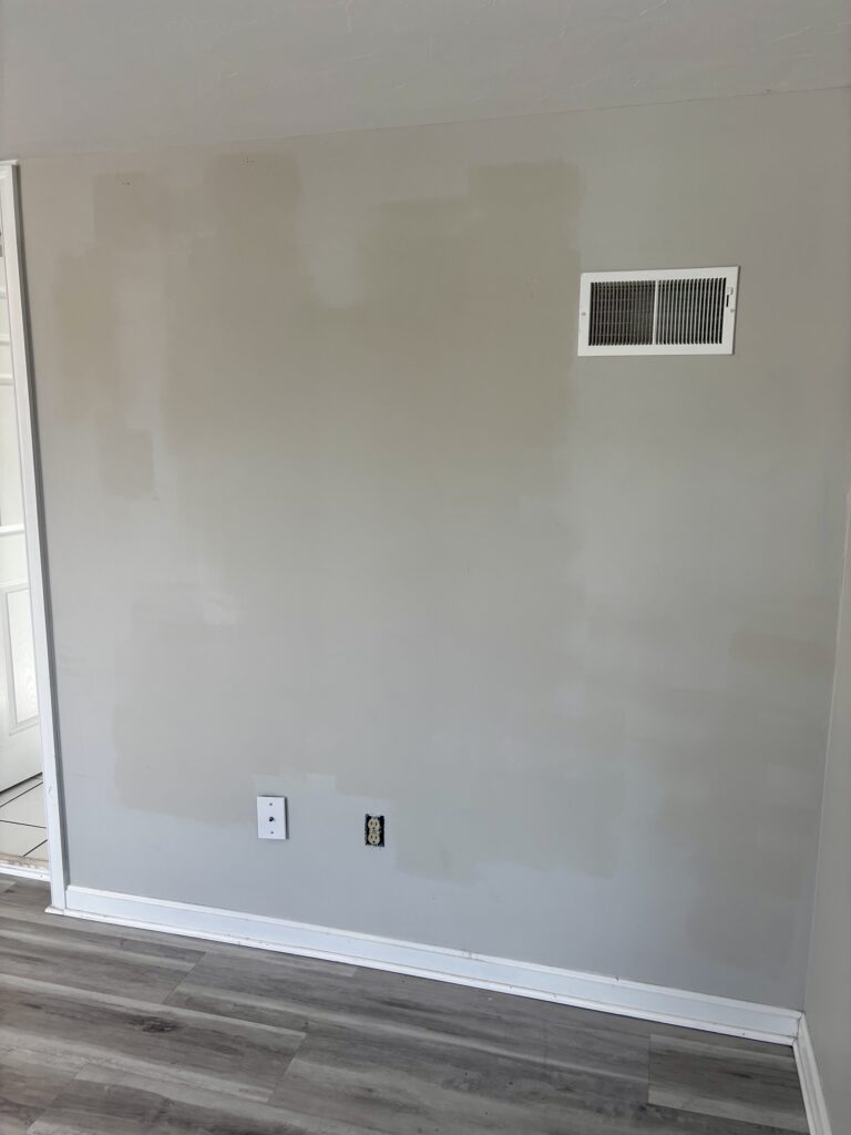 Mismatched paint on rental property walls